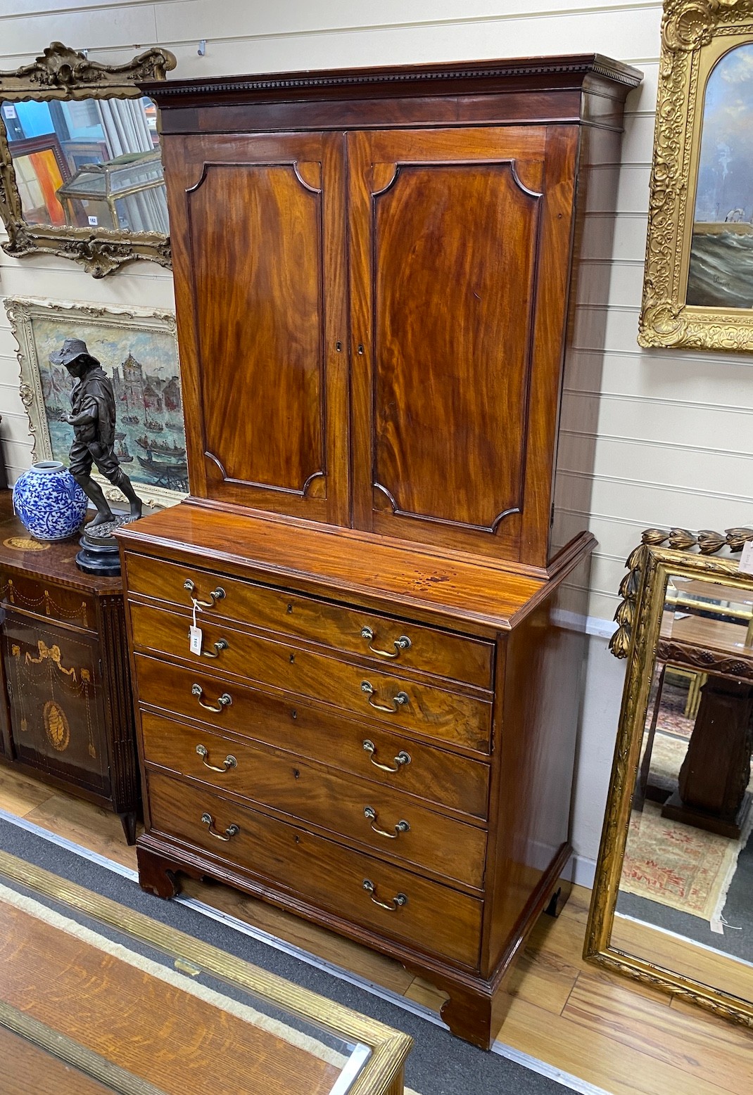 A George III mahogany secretaire cabinet, width 108cm, depth 56cm, height 213cm
